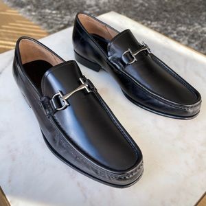 Salvatore Ferragamo Men’s Moccassin with Gancini Ornament (Black).  7.5 EE